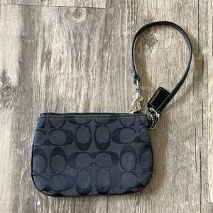 Signature Coach wristlet.